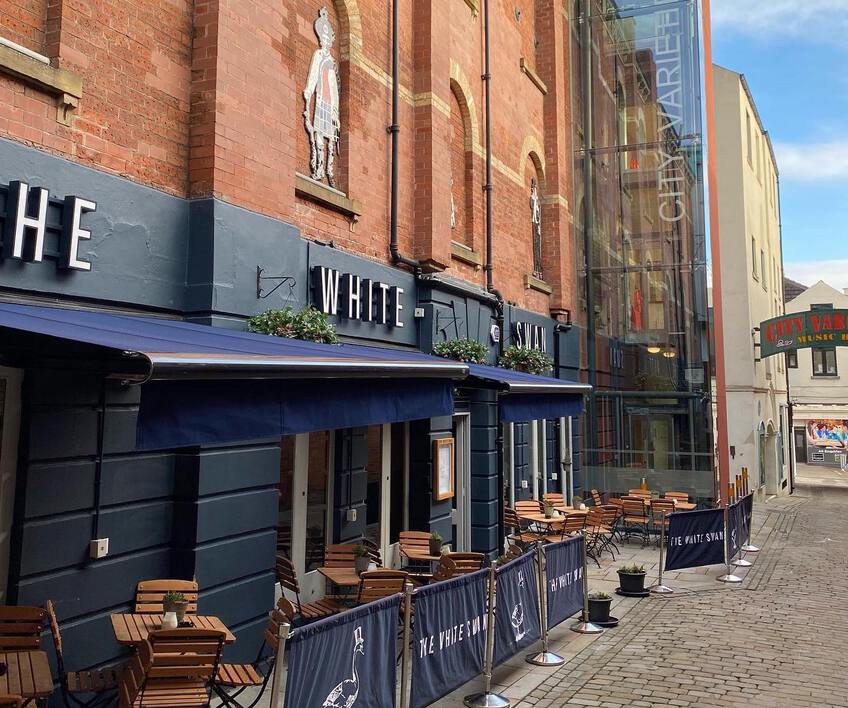 The outside of The White Swan pub on Swan Street in the sunshine. Recommended by Treasure Hunt Leeds.